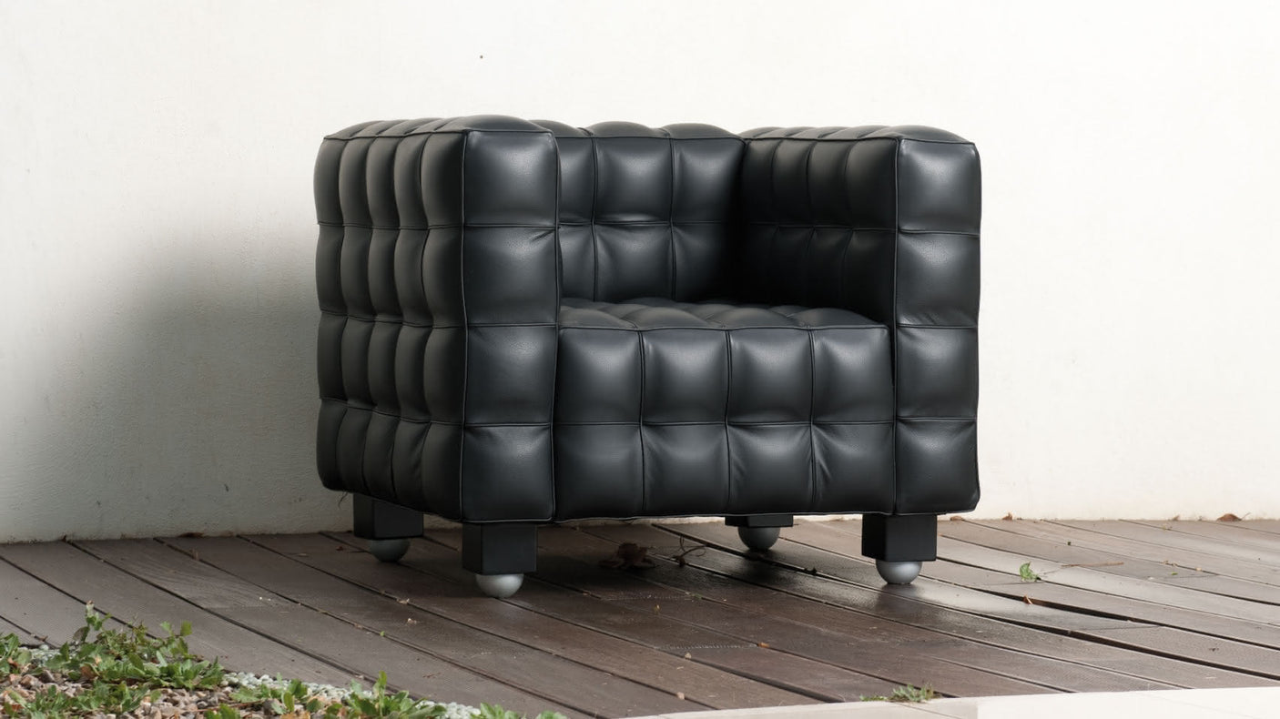 Kubus armchair with leather covering classic design